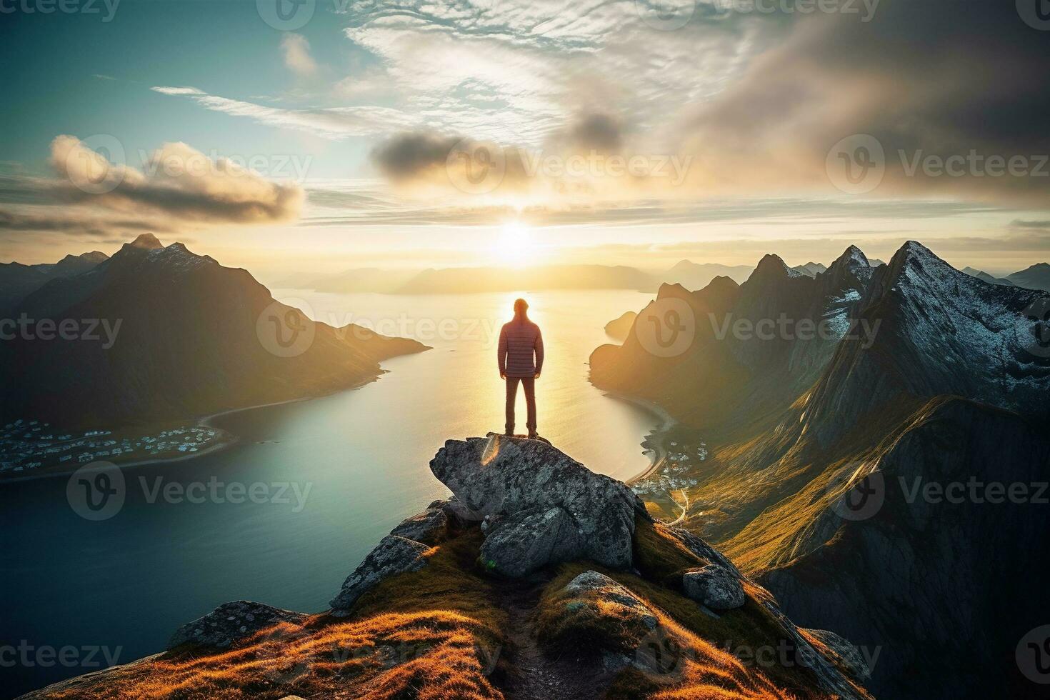 Man standing on the top of a mountain and enjoying the view AI generated photo
