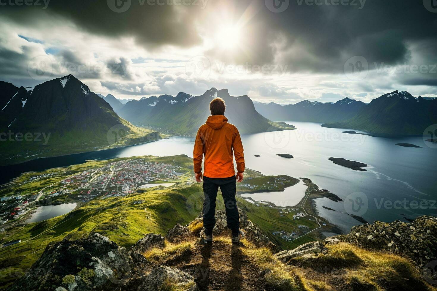 Man standing on the top of a mountain and enjoying the view AI generated photo