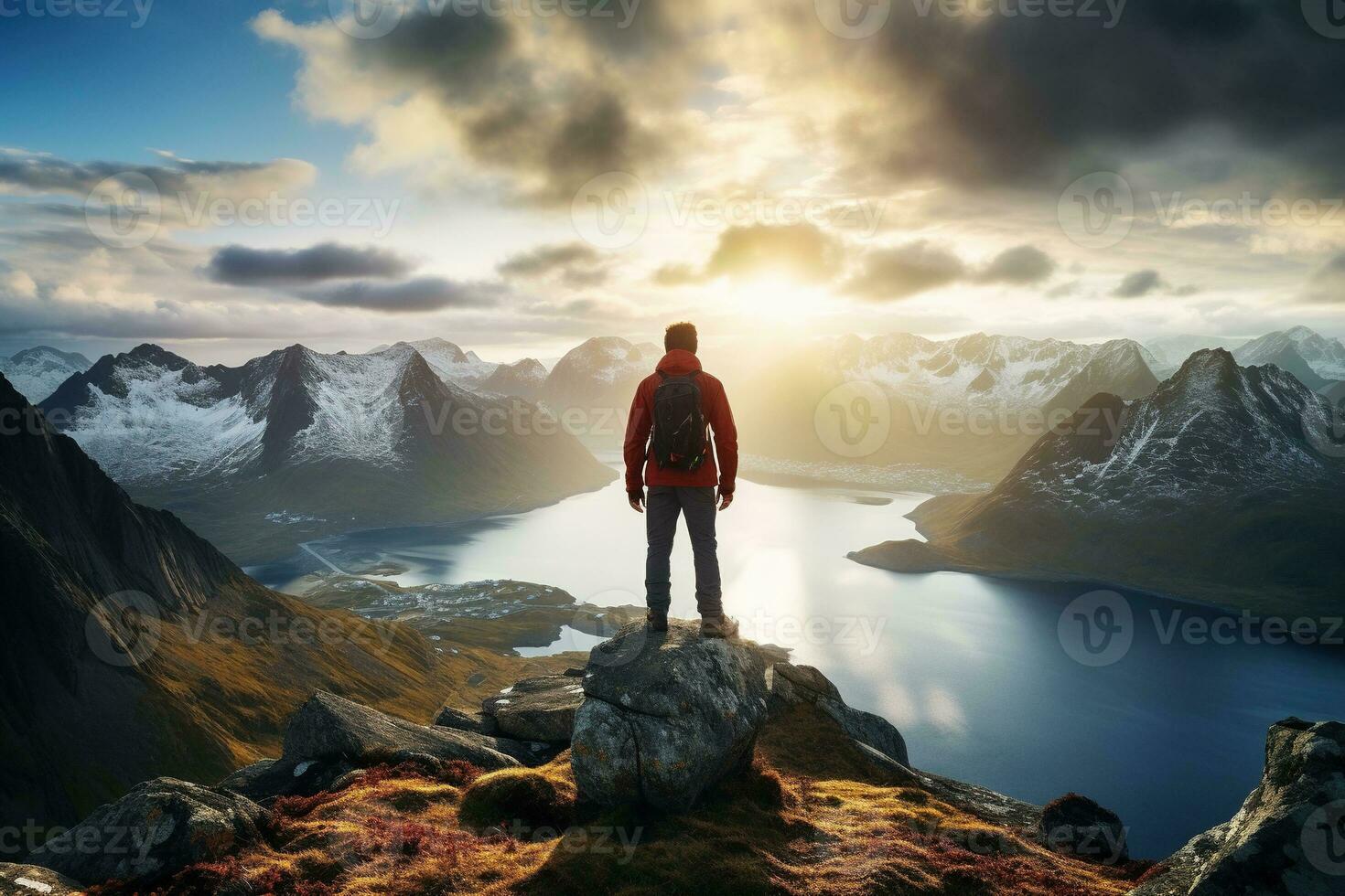 Man standing on the top of a mountain and enjoying the view AI generated photo