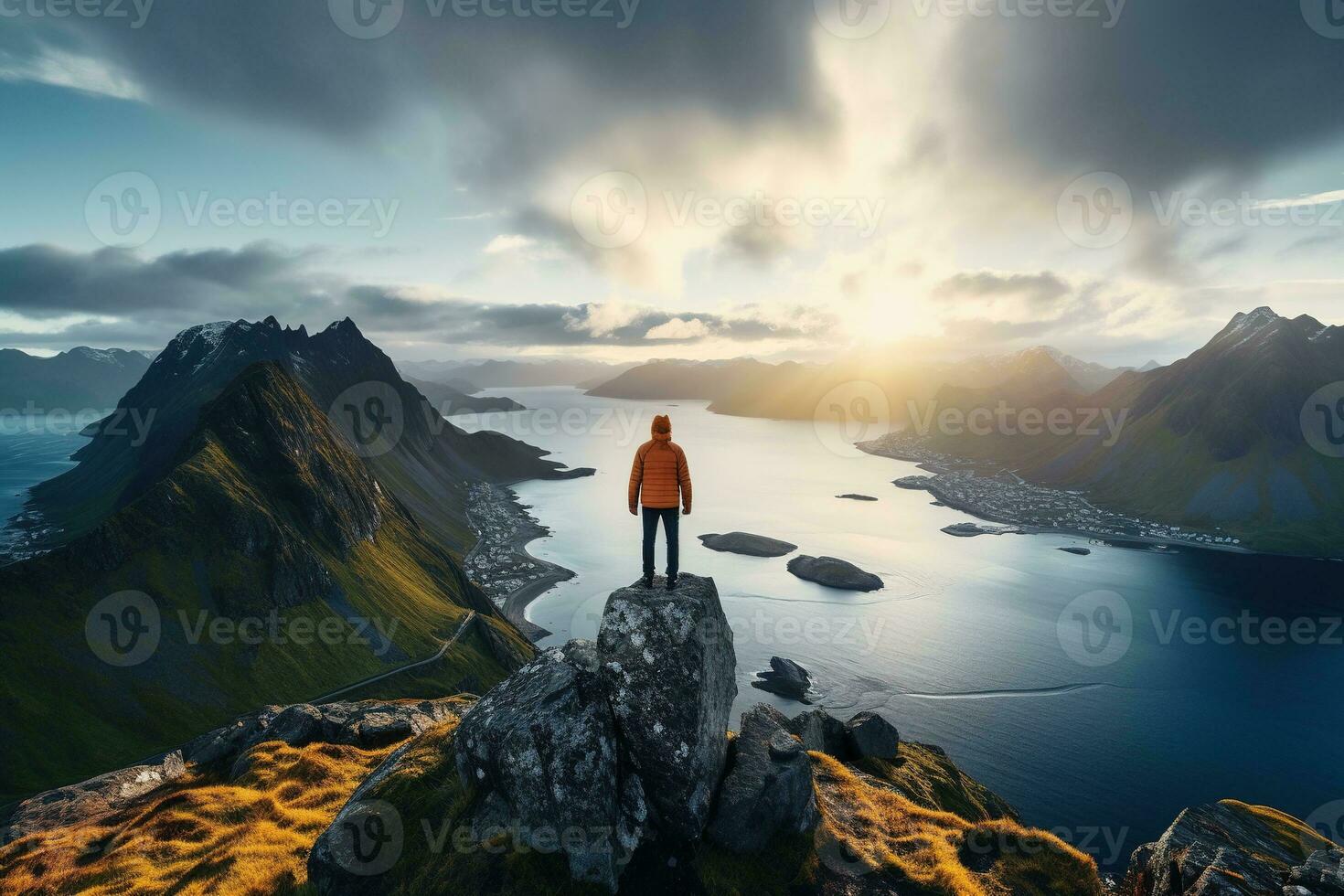 Man standing on the top of a mountain and enjoying the view AI generated photo