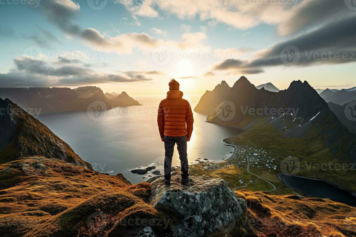 Man standing on the top of a mountain and enjoying the view AI generated photo
