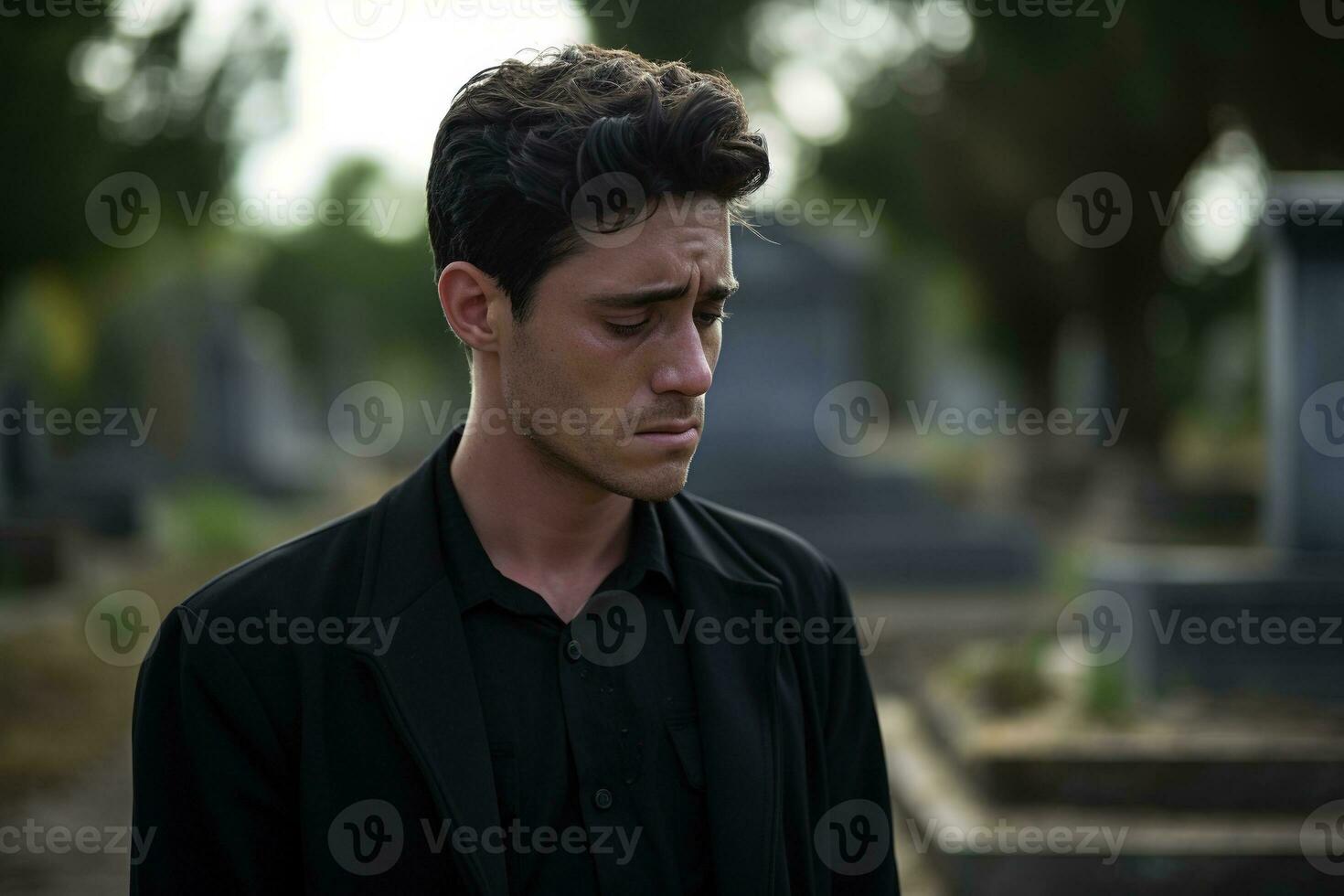 Portrait of a sad and depressed man in a black coat on the background of a cemetery.Funeral Concept AI generated photo