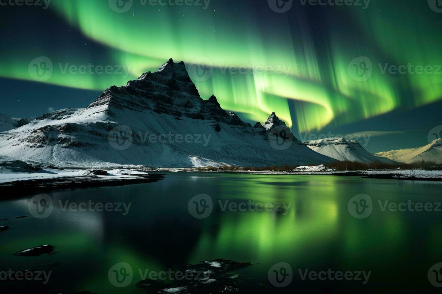 Aurora borealis in Iceland with snow covered mountains and reflection AI generated photo