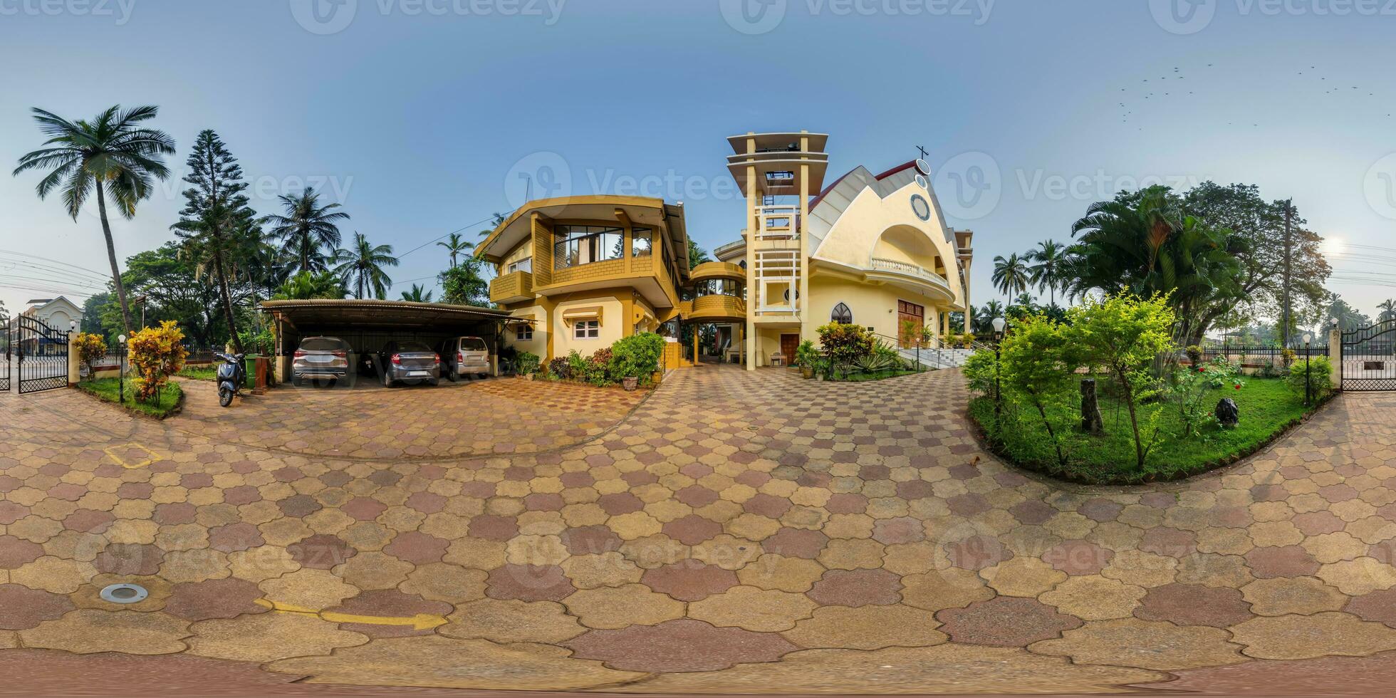 full hdri 360 panorama of modern catholic church in jungle among palm trees in Indian tropic village in equirectangular projection with zenith and nadir. VR AR content photo