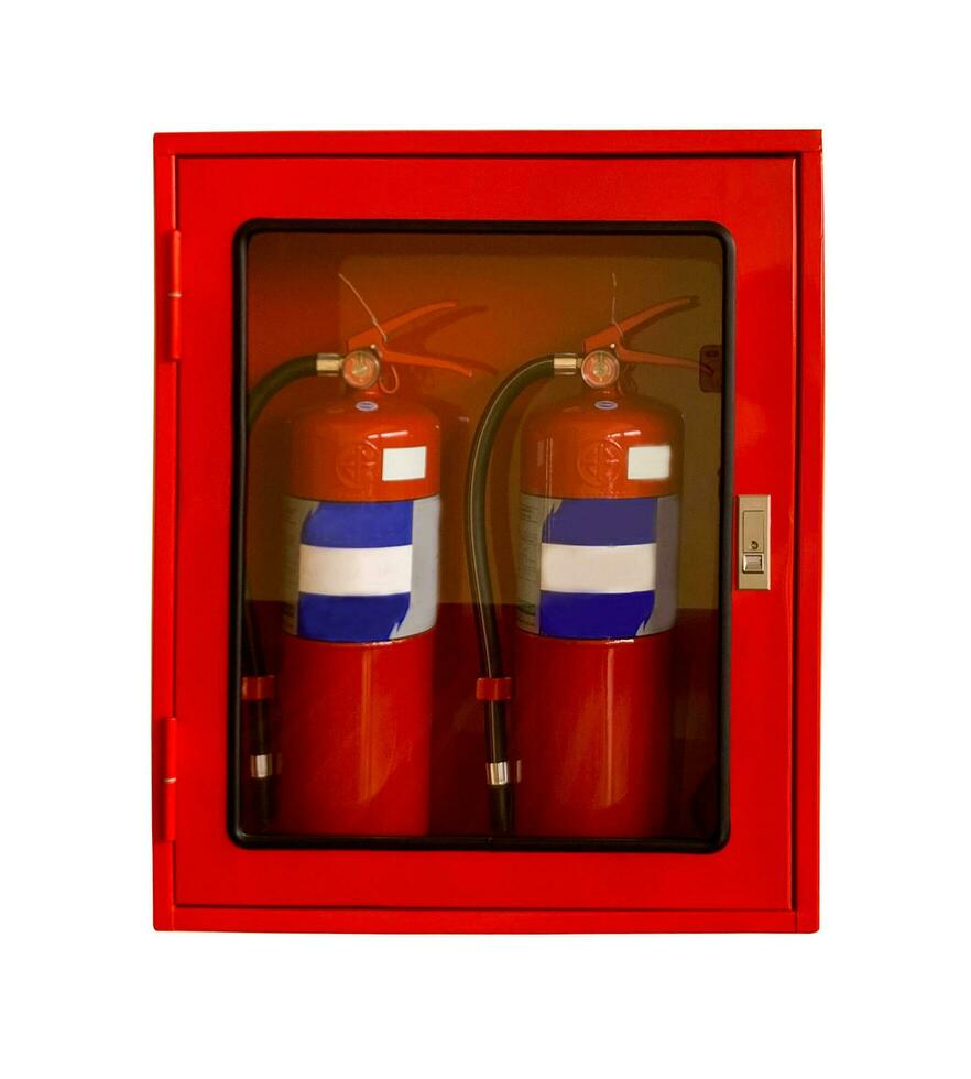 Two wall-mounted fire extinguishers in an easily accessible case. Mounted on the wall of an indoor office on a white background with clipping path photo