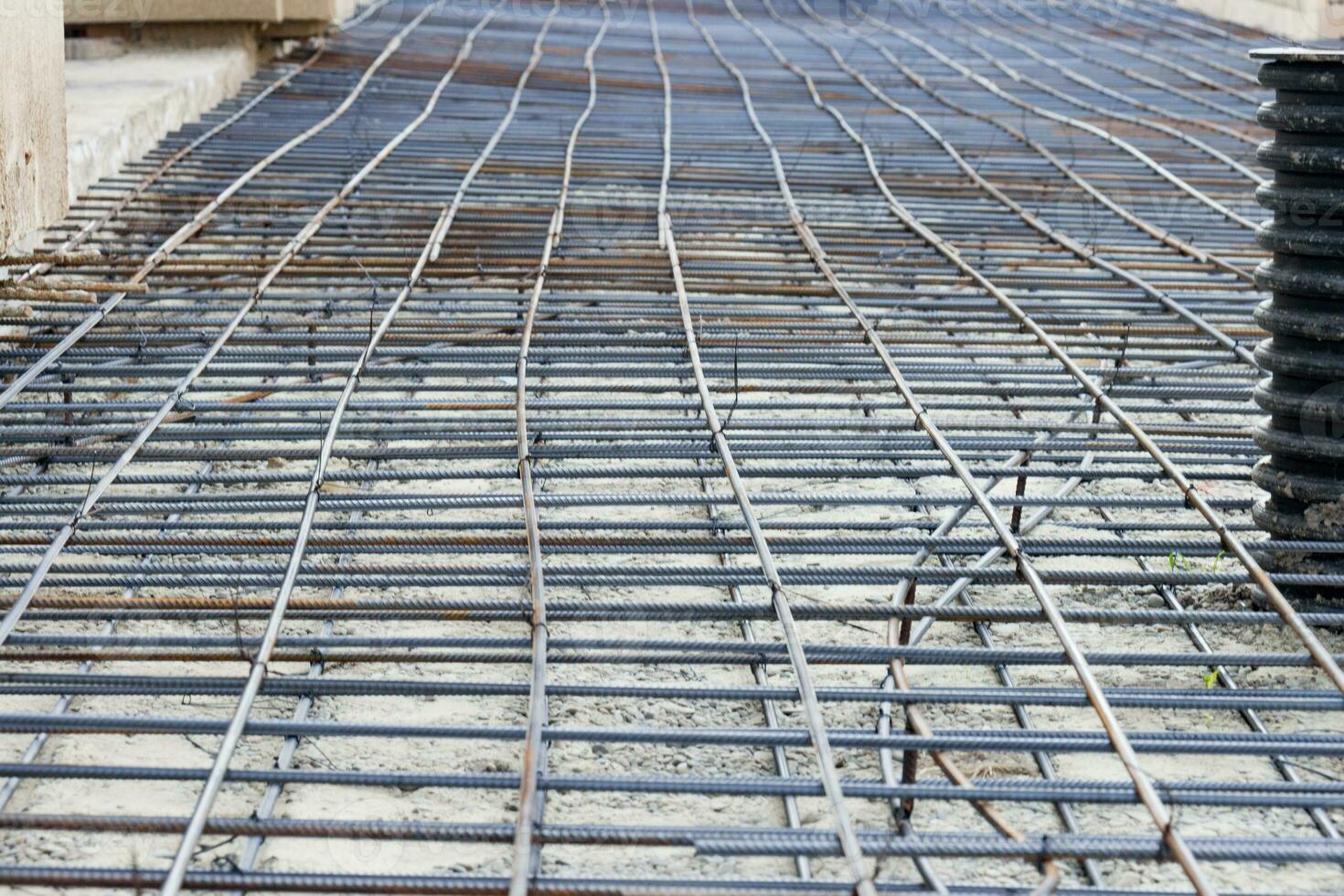 Background of reinforcing steel bars for building armature. Steel reinforcement in the construction of the building photo