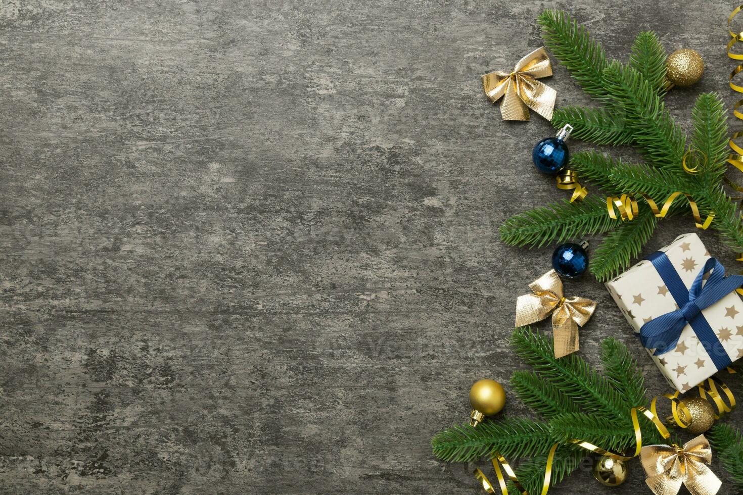 Christmas background with fir branches and Christmas decor. Top view, copy space for text photo