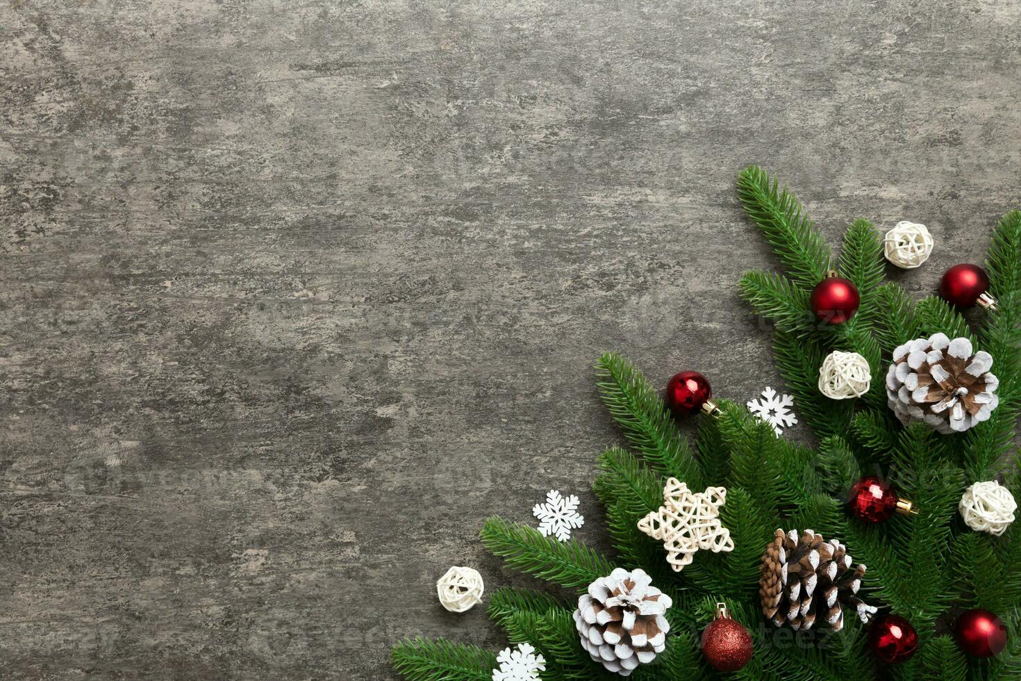 Christmas background with fir branches and Christmas decor. Top view, copy space for text photo