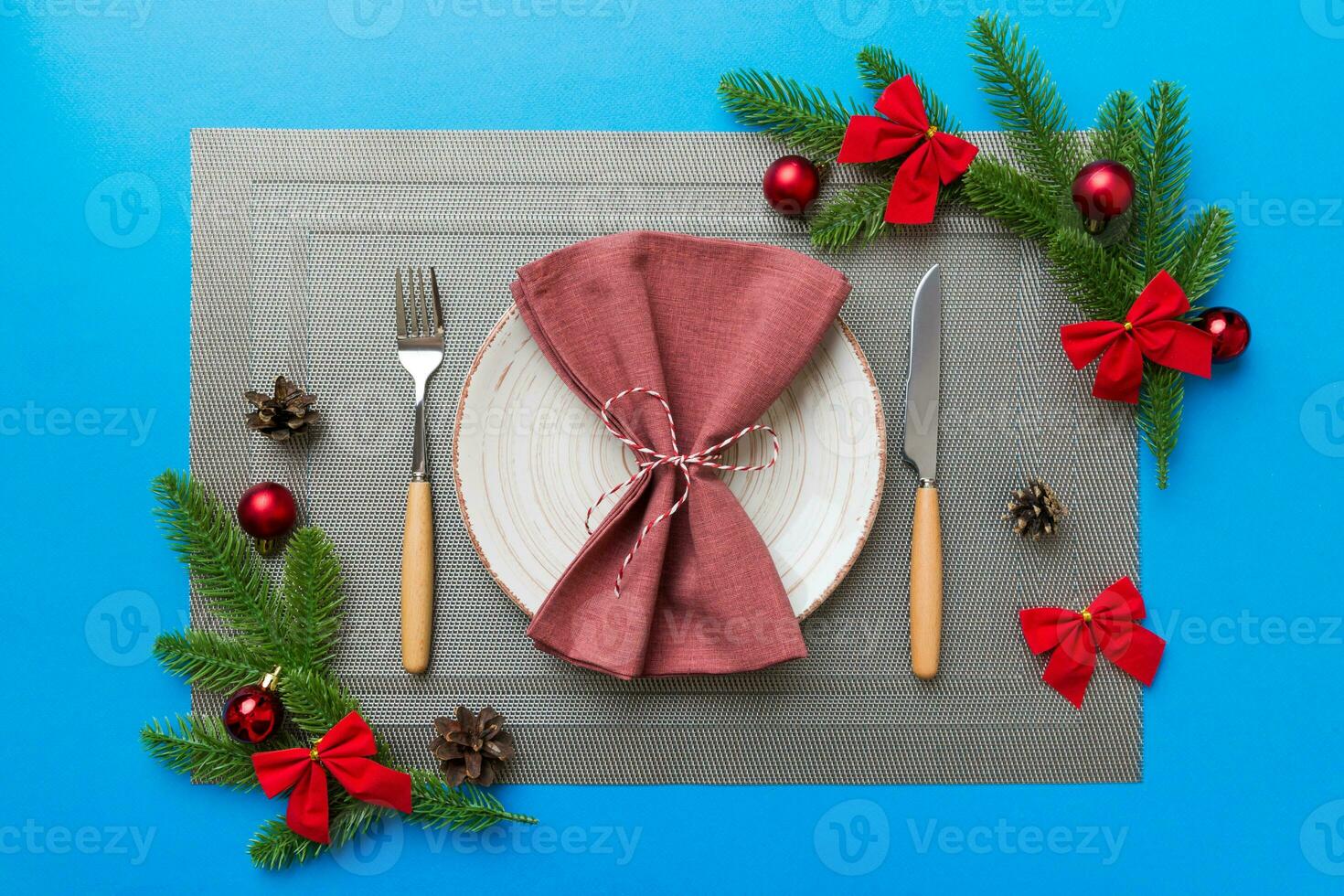 Christmas dinner background with rustic decorations and kitchen utensil . View from above photo