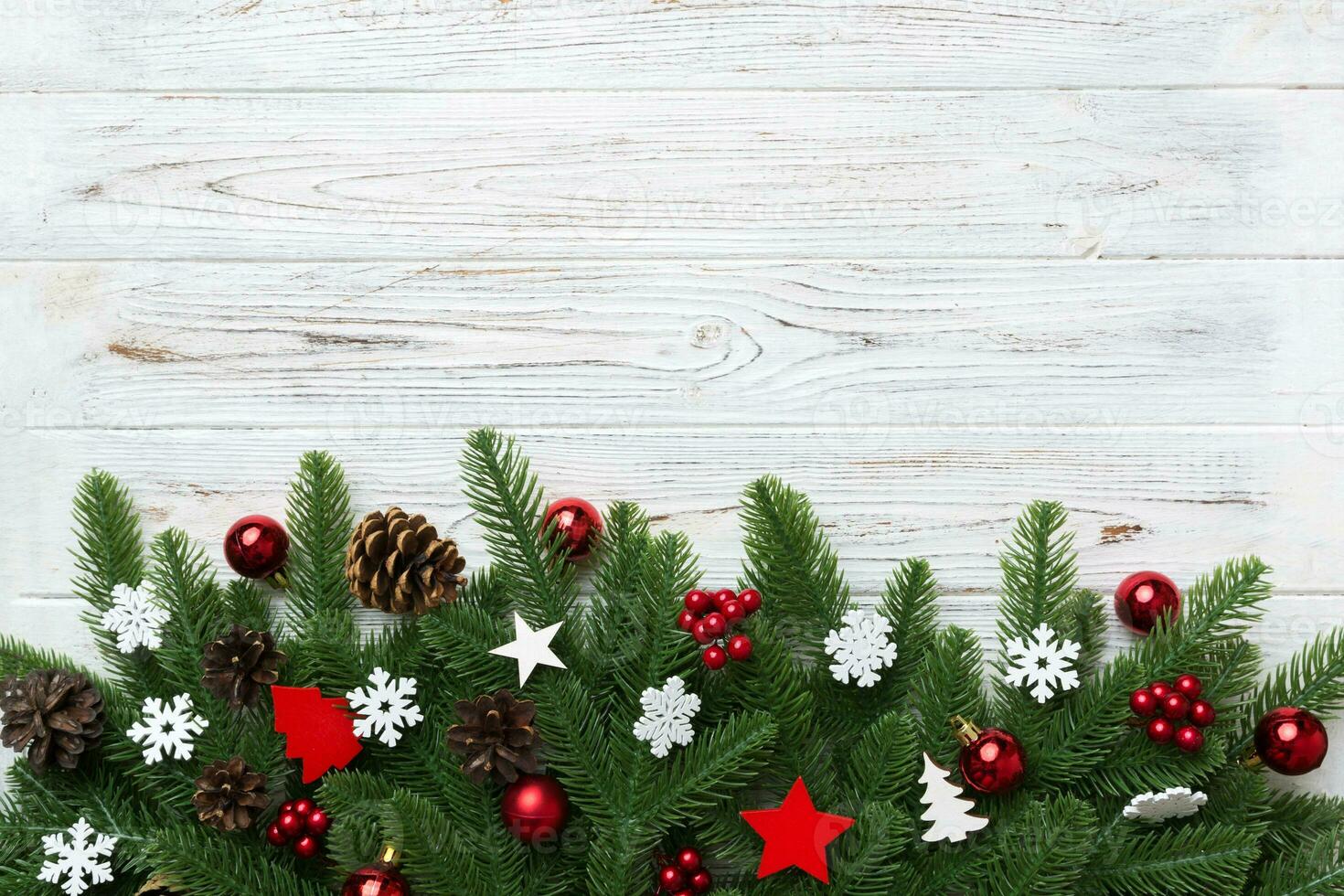 Christmas background with fir branches and Christmas decor. Top view, copy space for text photo
