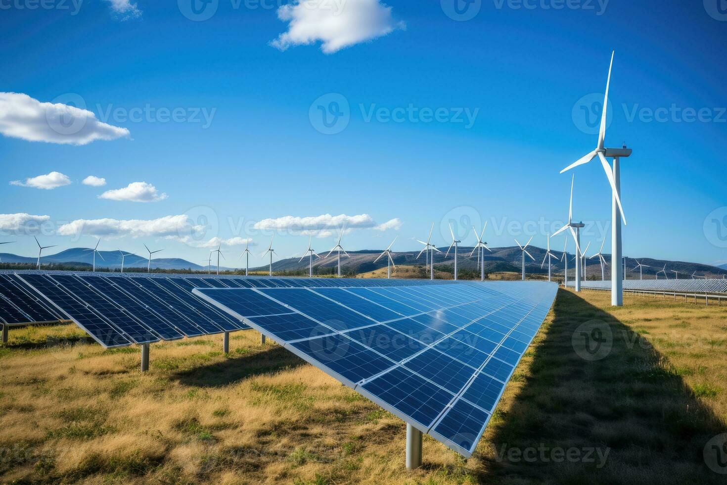 Creating sustainable energy using solar panels and wind farms is ...