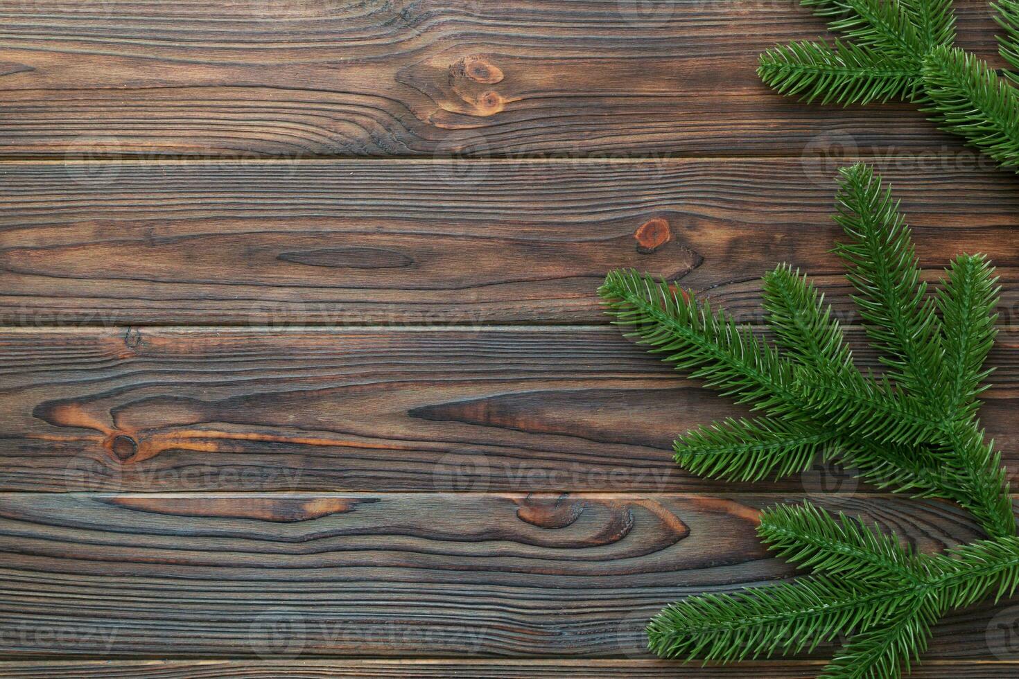 Christmas holiday background with copy space for advertising text. Fir branches on color background . Flat lay, top view photo