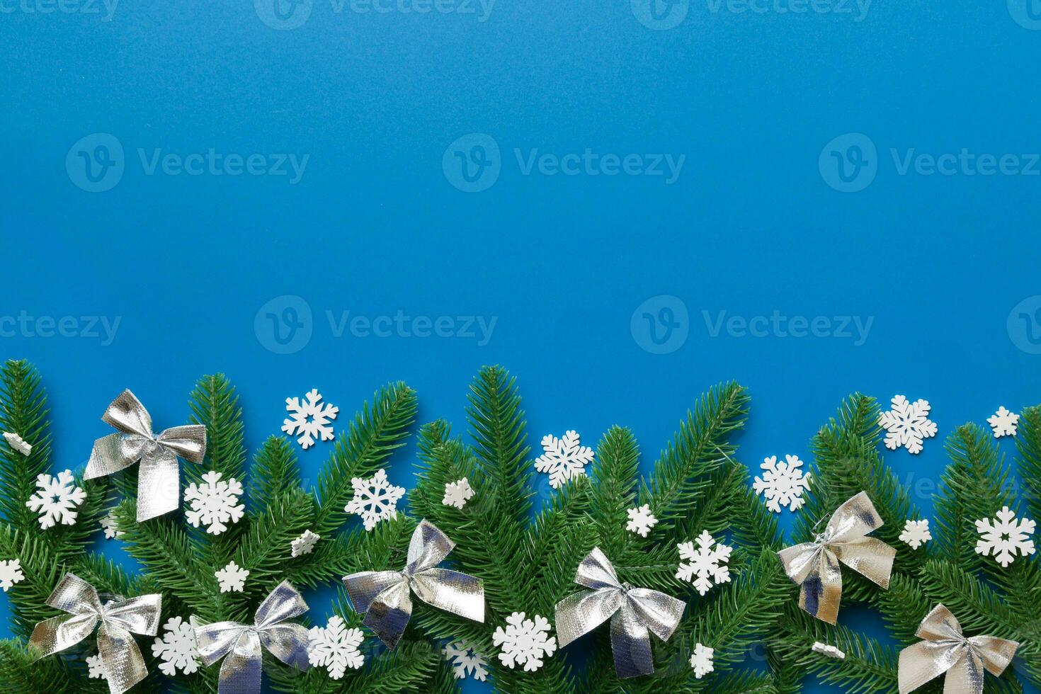 Christmas background with fir branches and Christmas decor. Top view, copy space for text photo