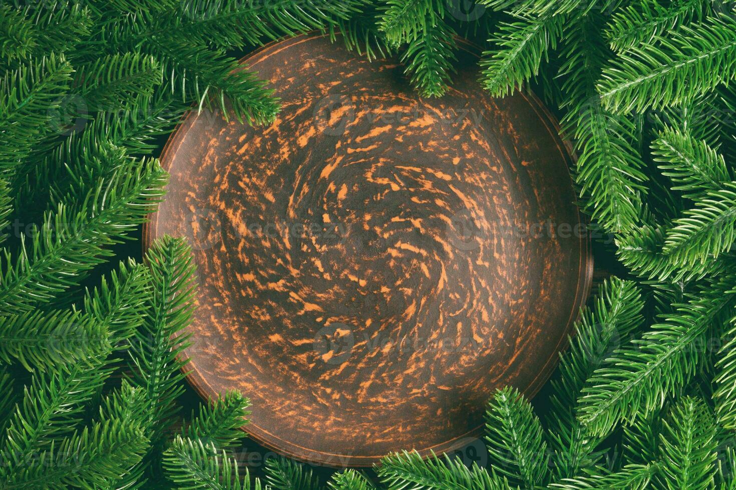Top view served plate with green fir tree branches. Holiday dinner concept with copy space photo