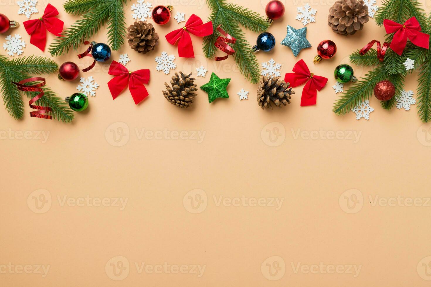 Christmas background with fir branches and Christmas decor. Top view, copy space for text photo