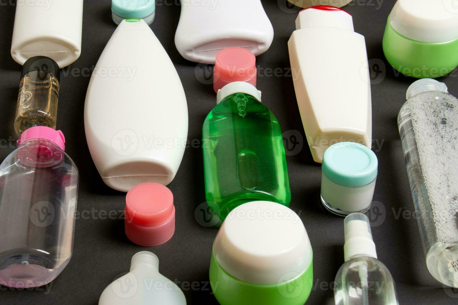 Group of plastic bodycare bottle Flat lay composition with cosmetic products on colored background empty space for you design. Set of White Cosmetic containers, top view with copy space photo