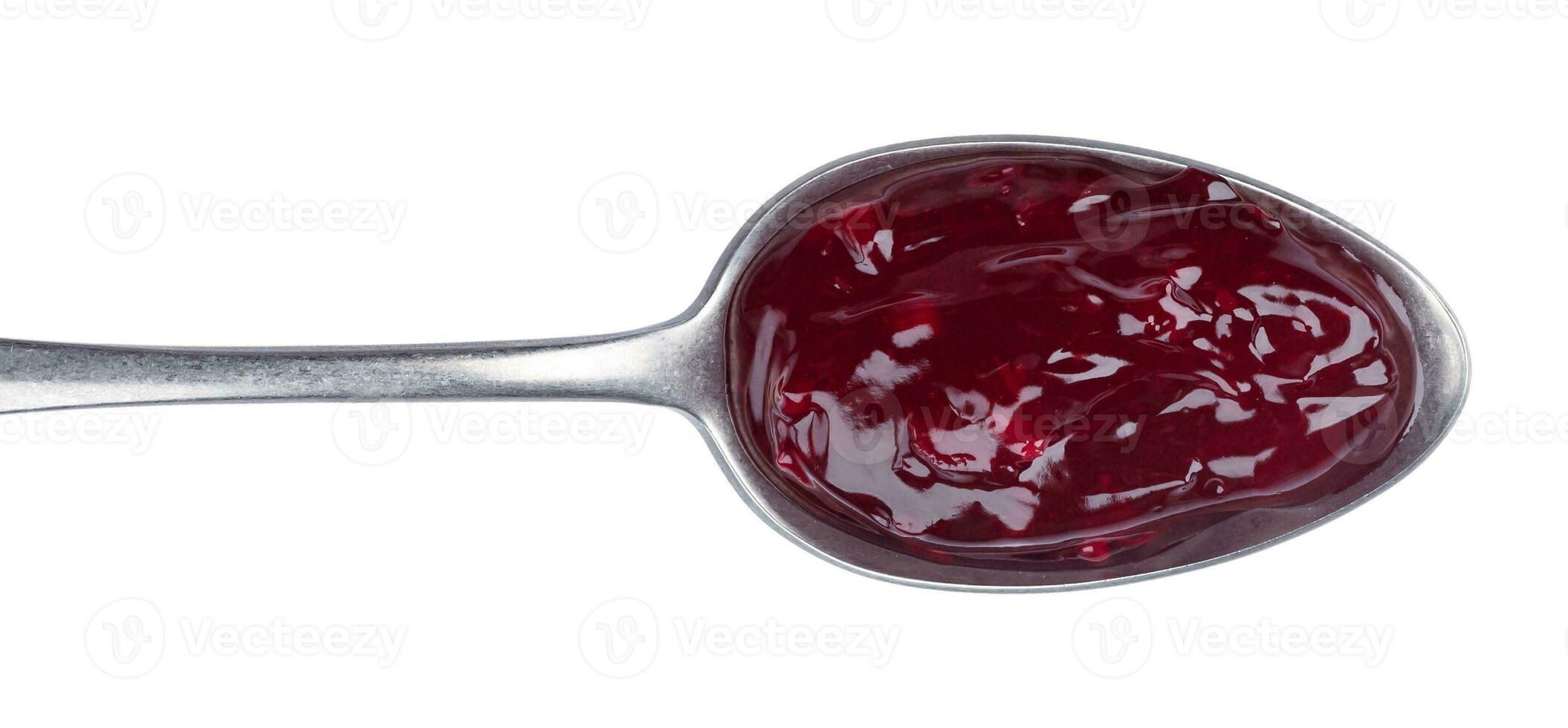 Spoon of red jam isolated on white background, top view photo