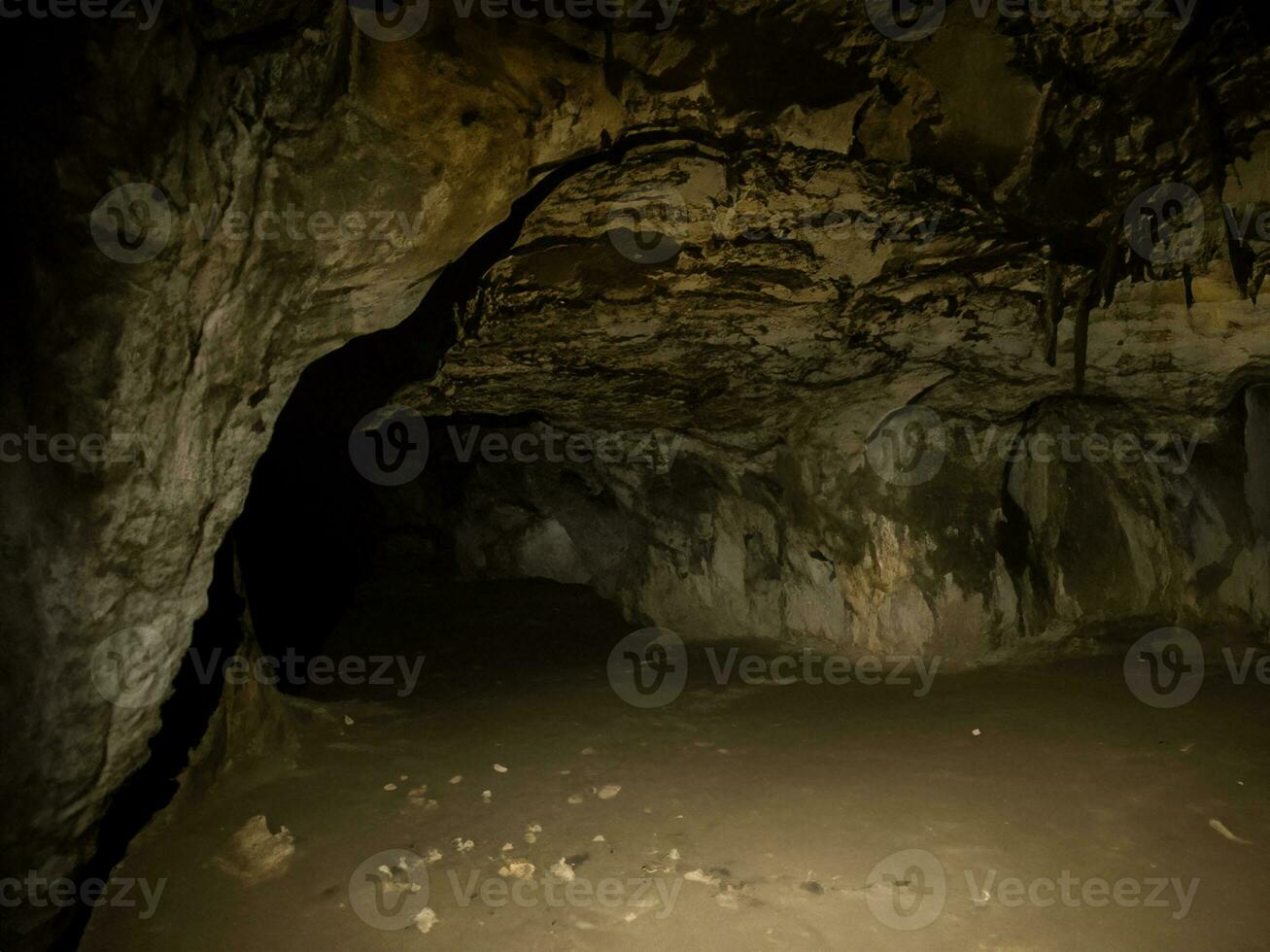 ancient stone walls of the cave in cappadocia, turkey photo