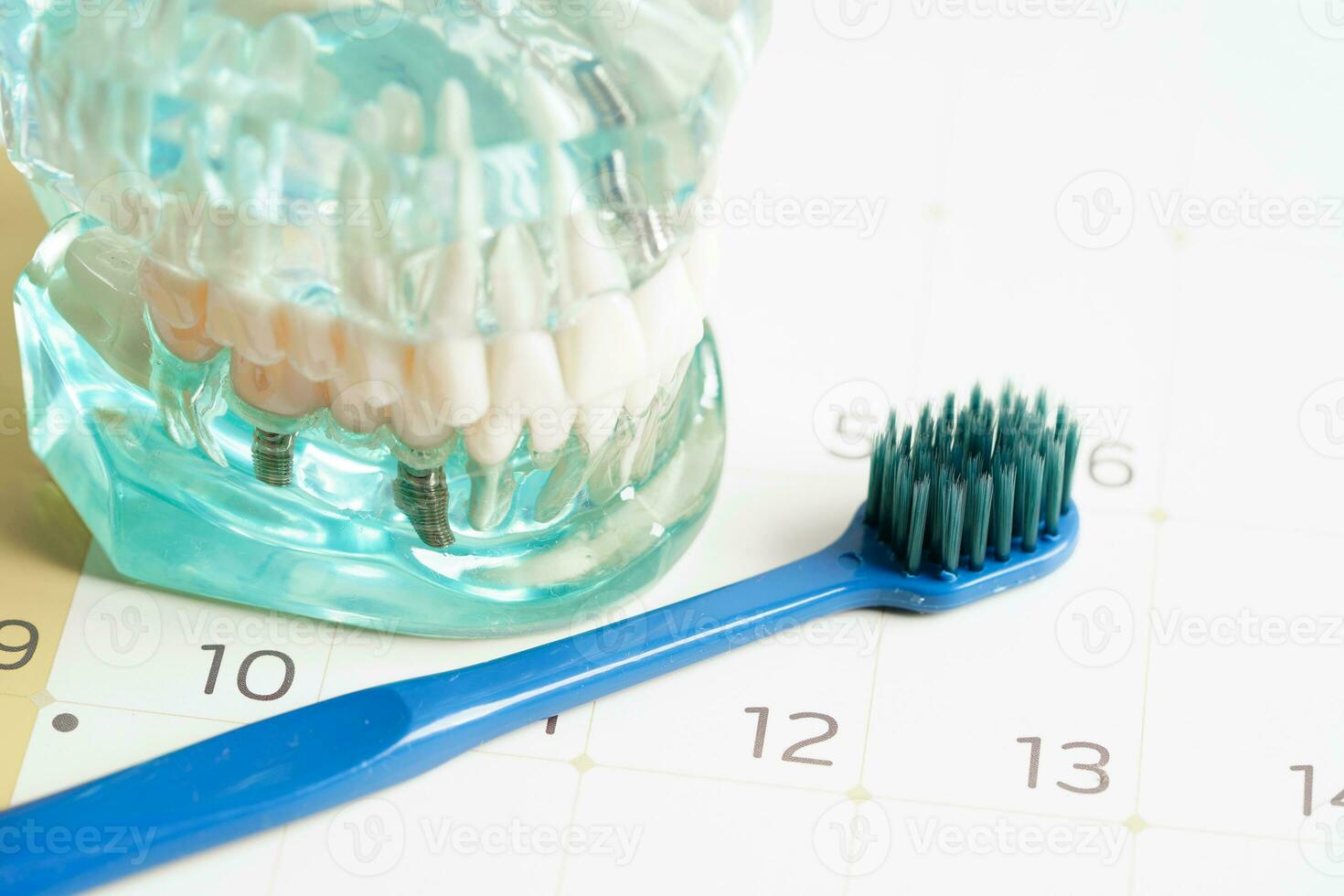 Dental appointment reminder in calendar, healthy teeth, dental health care. photo