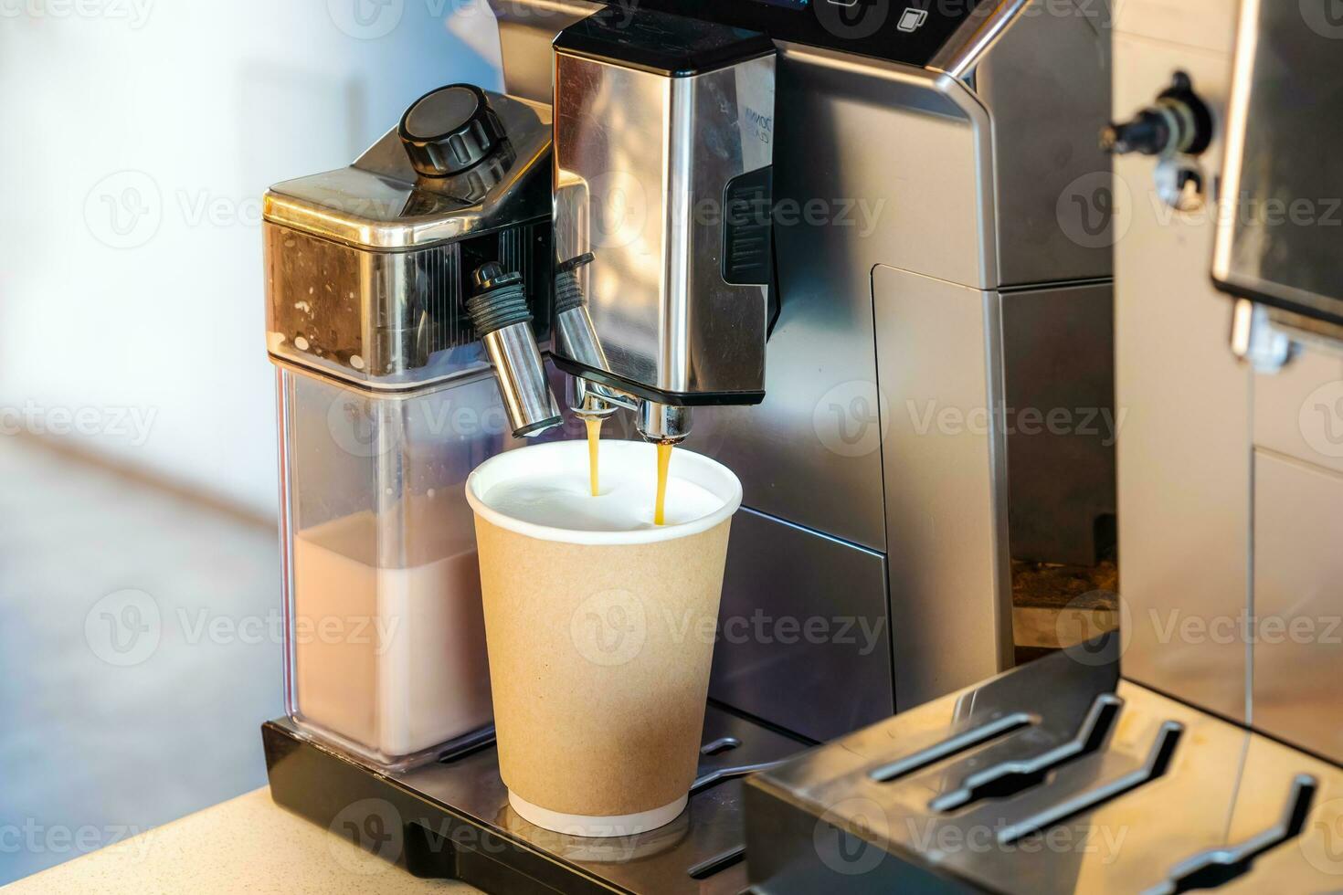 Coffee machine for preparing delicious cappuccino, latte, espresso in the process of producing aromatic coffee photo