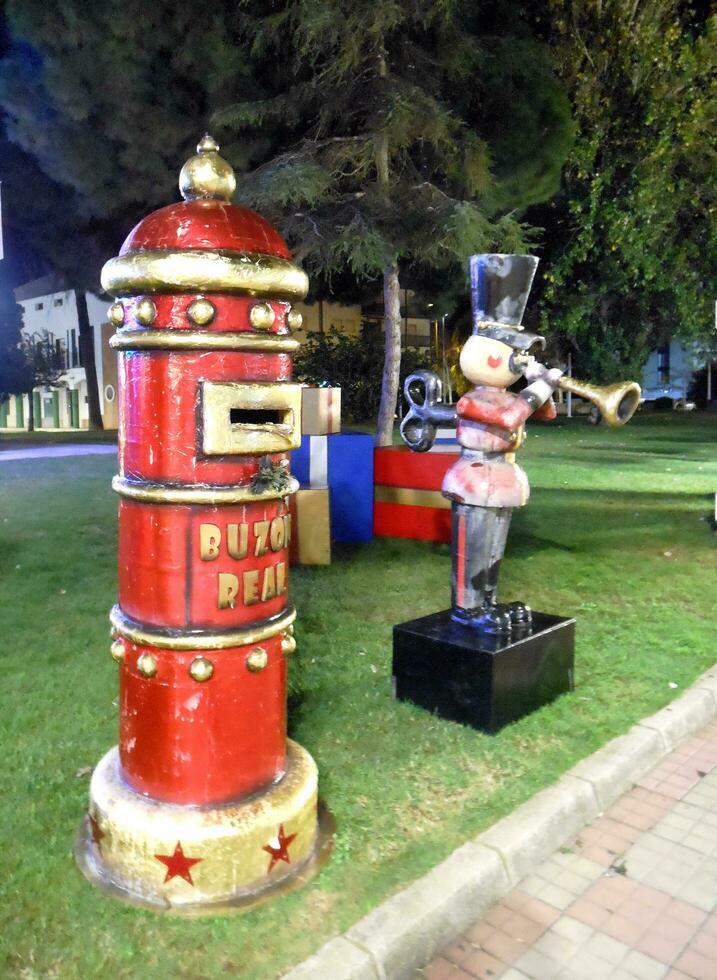 Royal postbox and a soldier with a trumpet at Christmas photo
