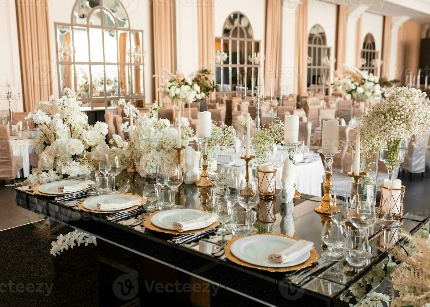 Main table for newlyweds. Luxury decor in expensive tones arrangement. photo