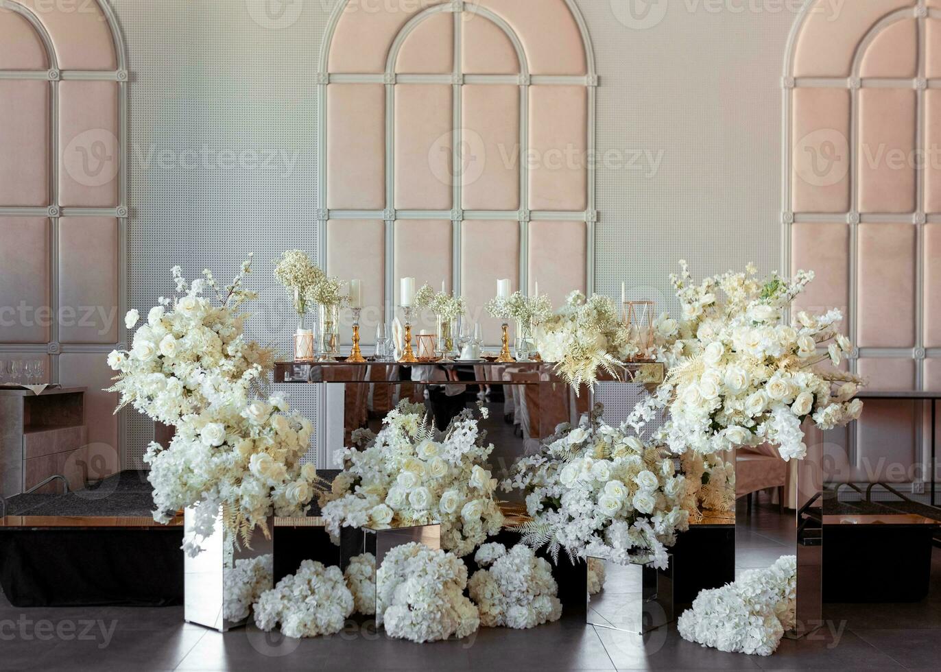 table floral arrangements. Luxury wedding decor in expensive tones photo