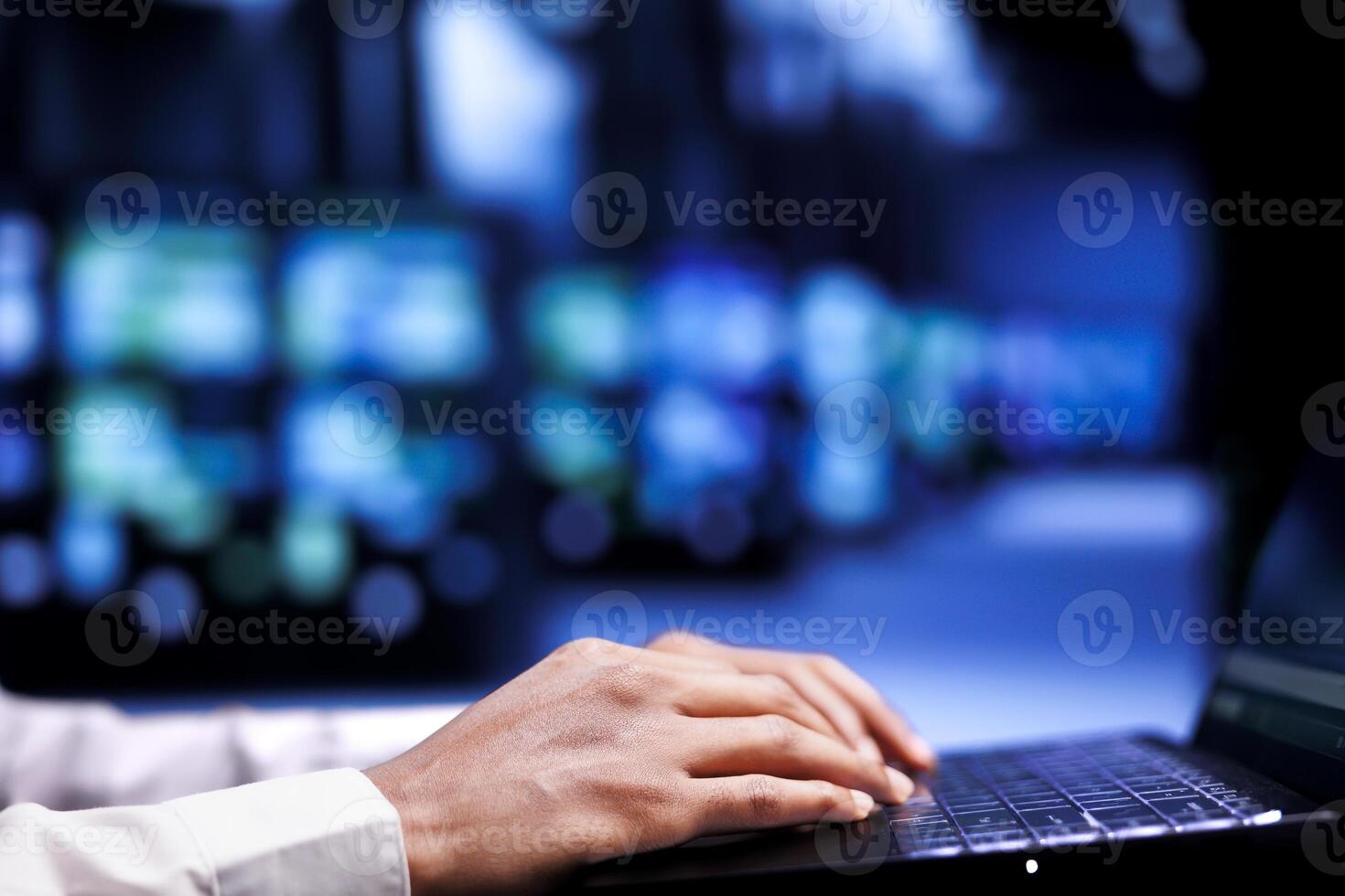 Close up shot of admin in cloud computing business using laptop to set up configuration management tools that enable automatic failover and load balancing, preventing server racks system crash photo