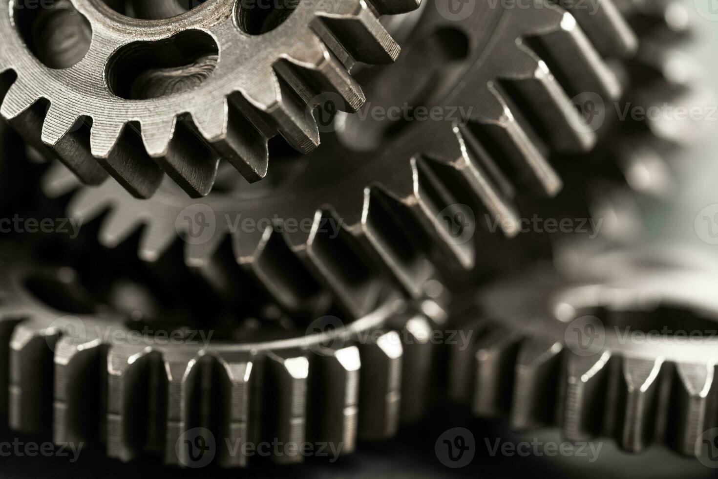 Gear and cogs wheels, clock mechanism, brass metal engine industrial. photo