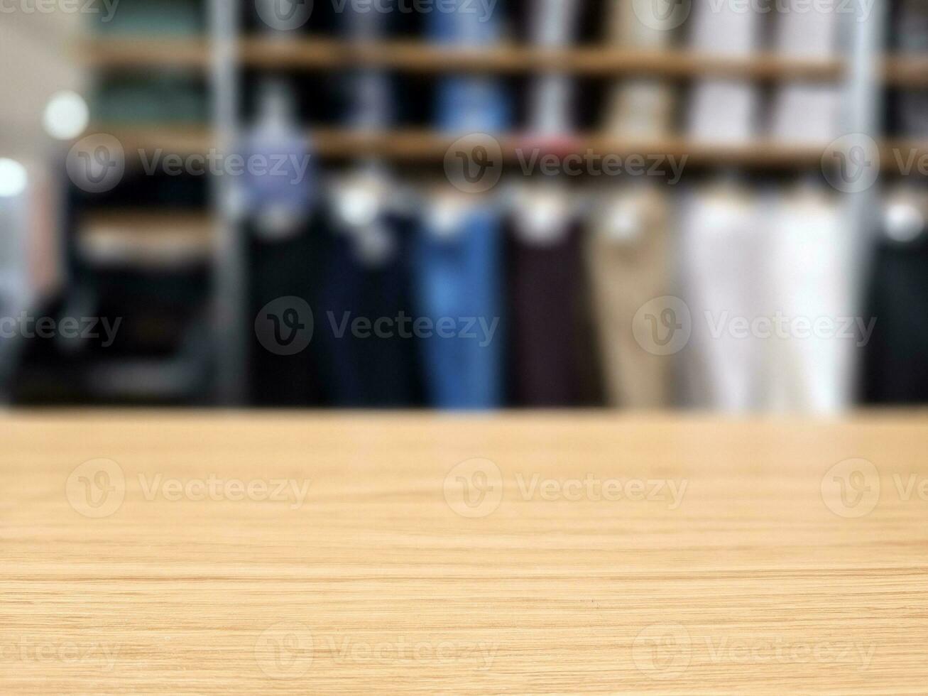 Wooden Table in Selective Focus with Blurred Boutique Store Background, Suitable for Product Presentation Backdrop, Display, and Mock up. photo