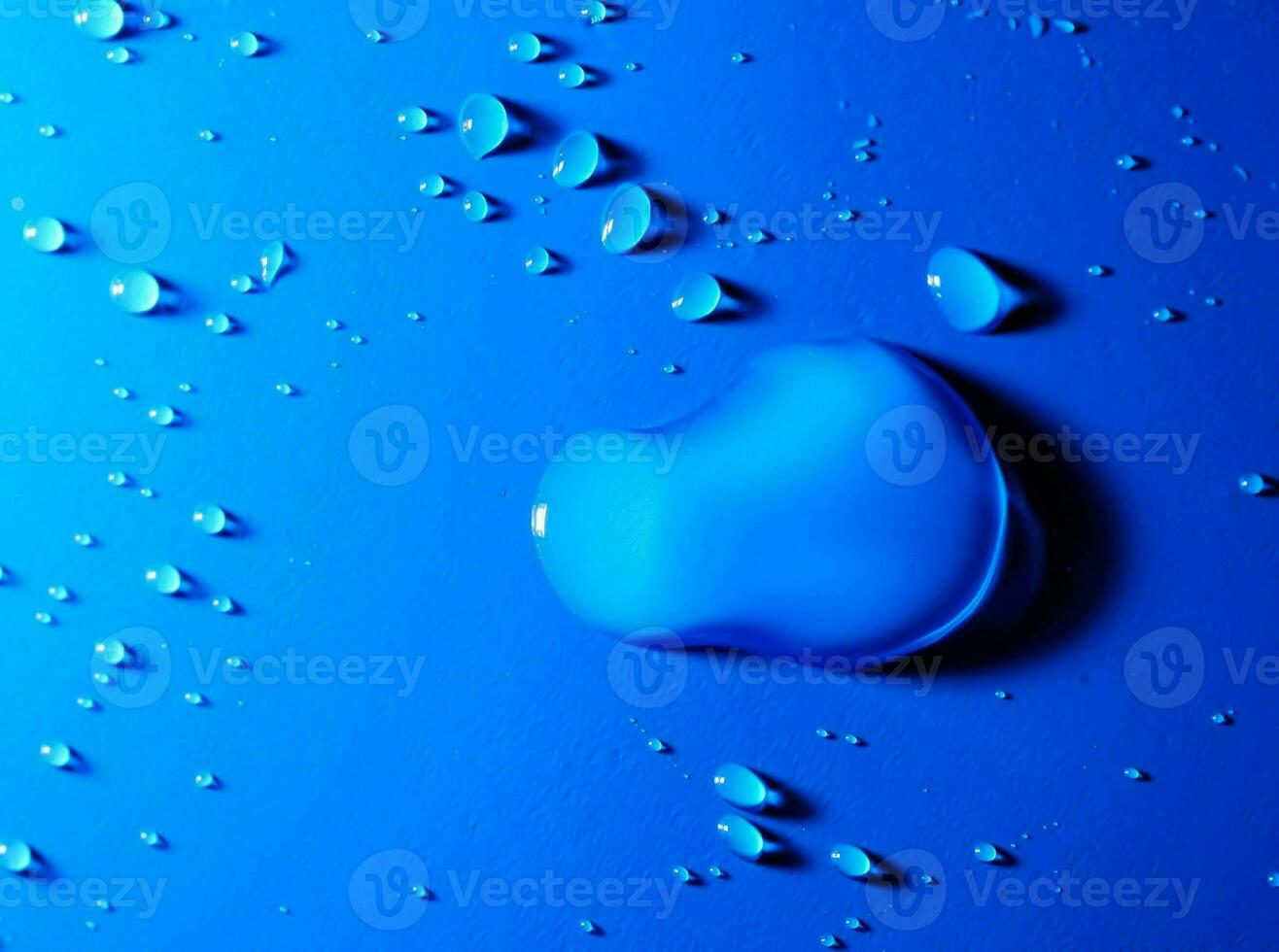 water drops on a blue background photo