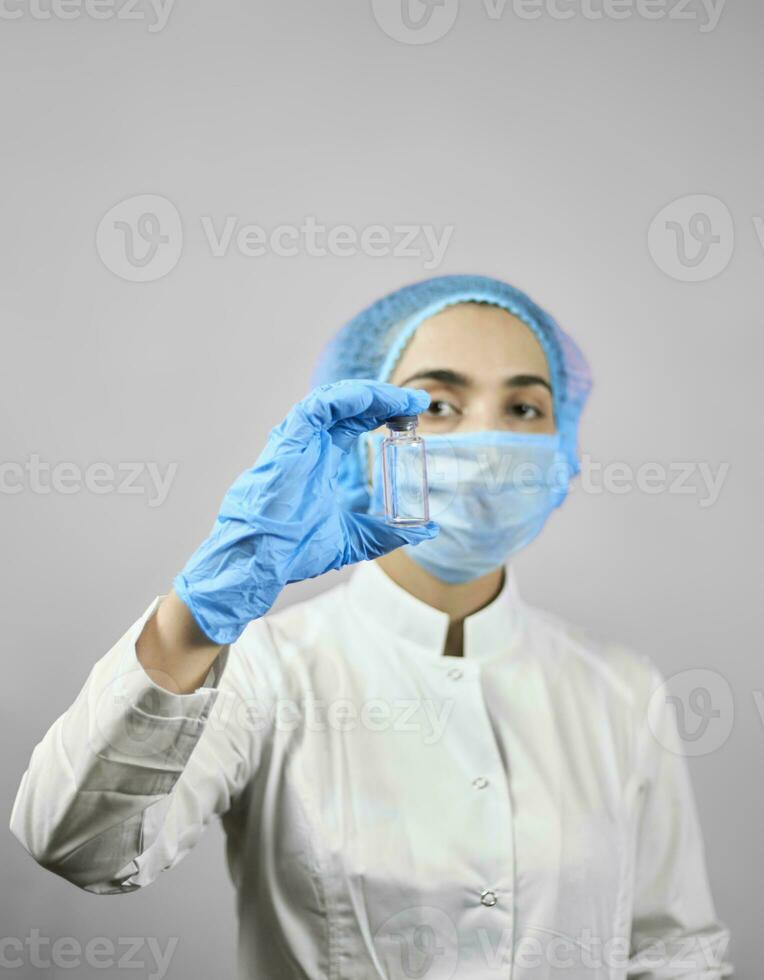 Scientist virologist hold coronavirus vaccine photo