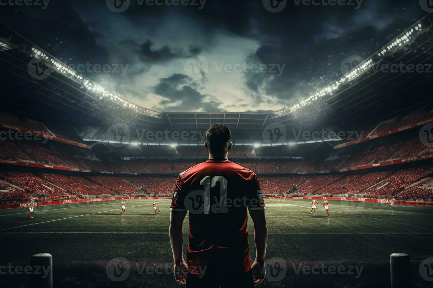 Rear view of football player in red jersey on stadium at night photo