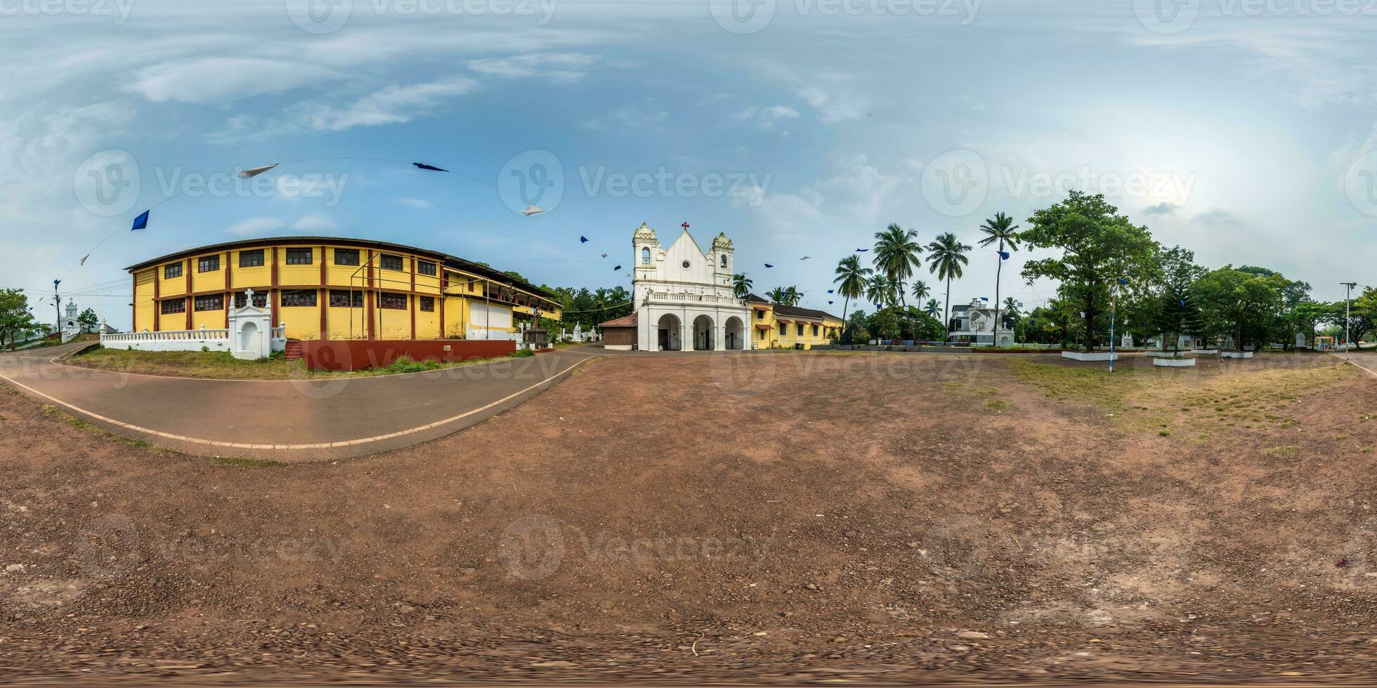 full hdri 360 panorama of portugese catholic church in jungle among palm trees in Indian tropic village in equirectangular projection with zenith and nadir. VR AR content photo