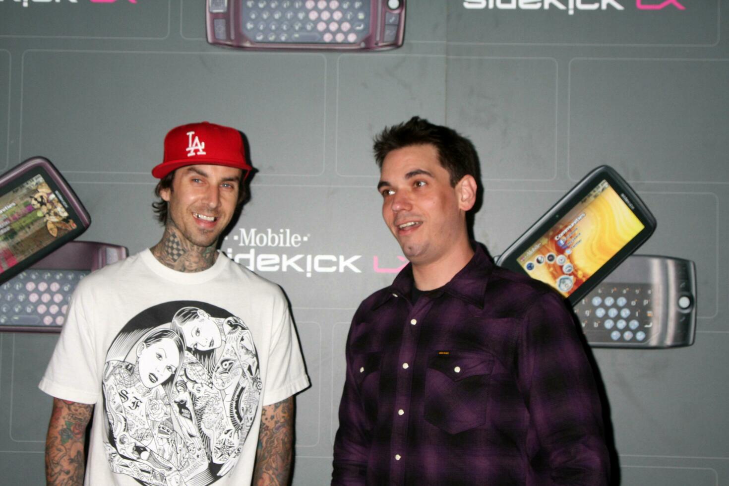 Travis Barker  DJ AM arriving at the  TMobile Sidekick LX Launch Event at  Paramount Studios inin Los Angeles CA on May 14 2009 photo