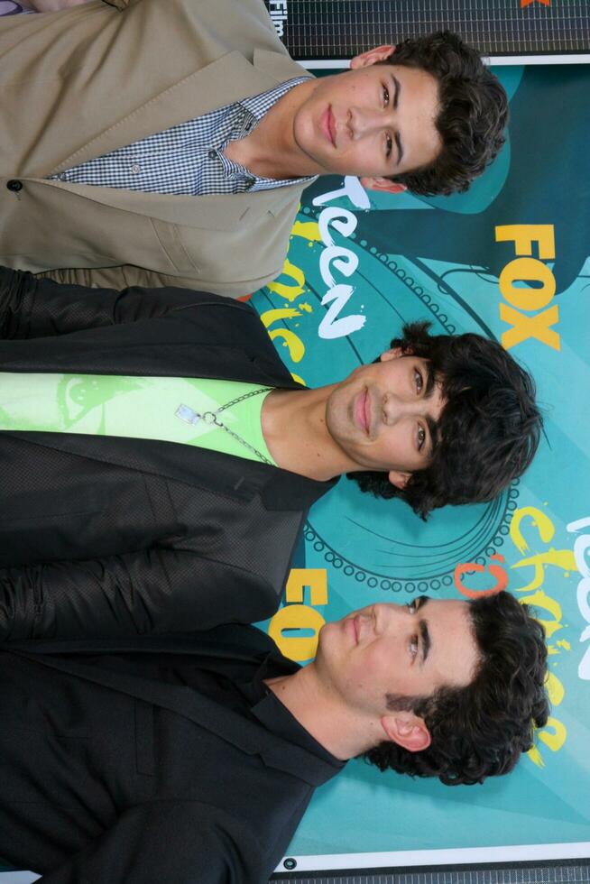 Jonas Brothers arriving at the Teen Choice Awards 2009 at Gibson Ampitheater at Universal Studios Los Angeles CA on August 9 2009 photo