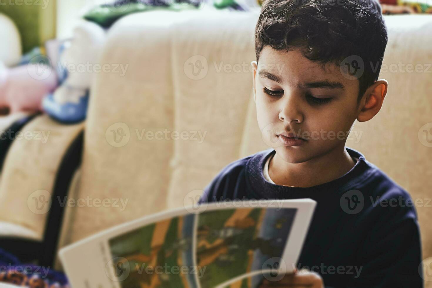 Little kid doing homework photo