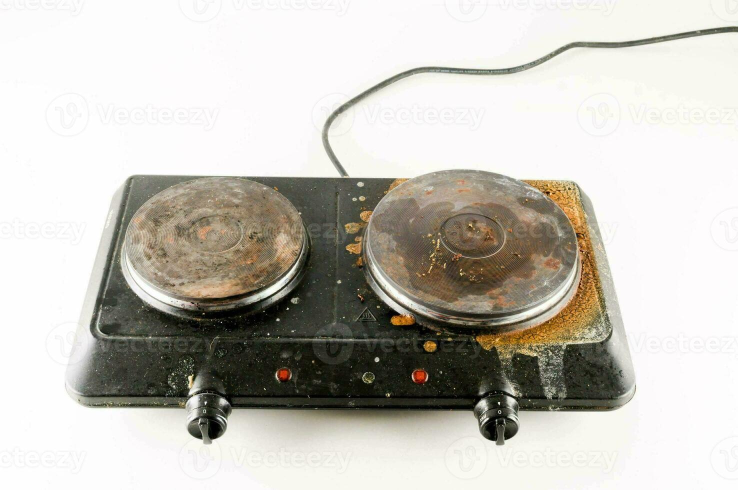 an old stove top with two burners on it photo