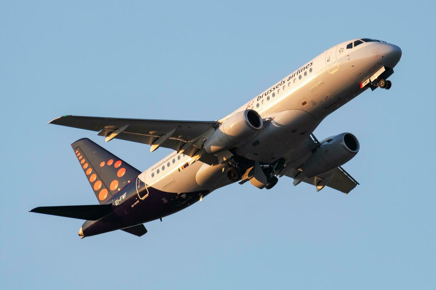 Brussels Airlines Sukhoi SSJ-100 Superjet EI-FWF passenger plane departure and take off at Vienna Airport photo