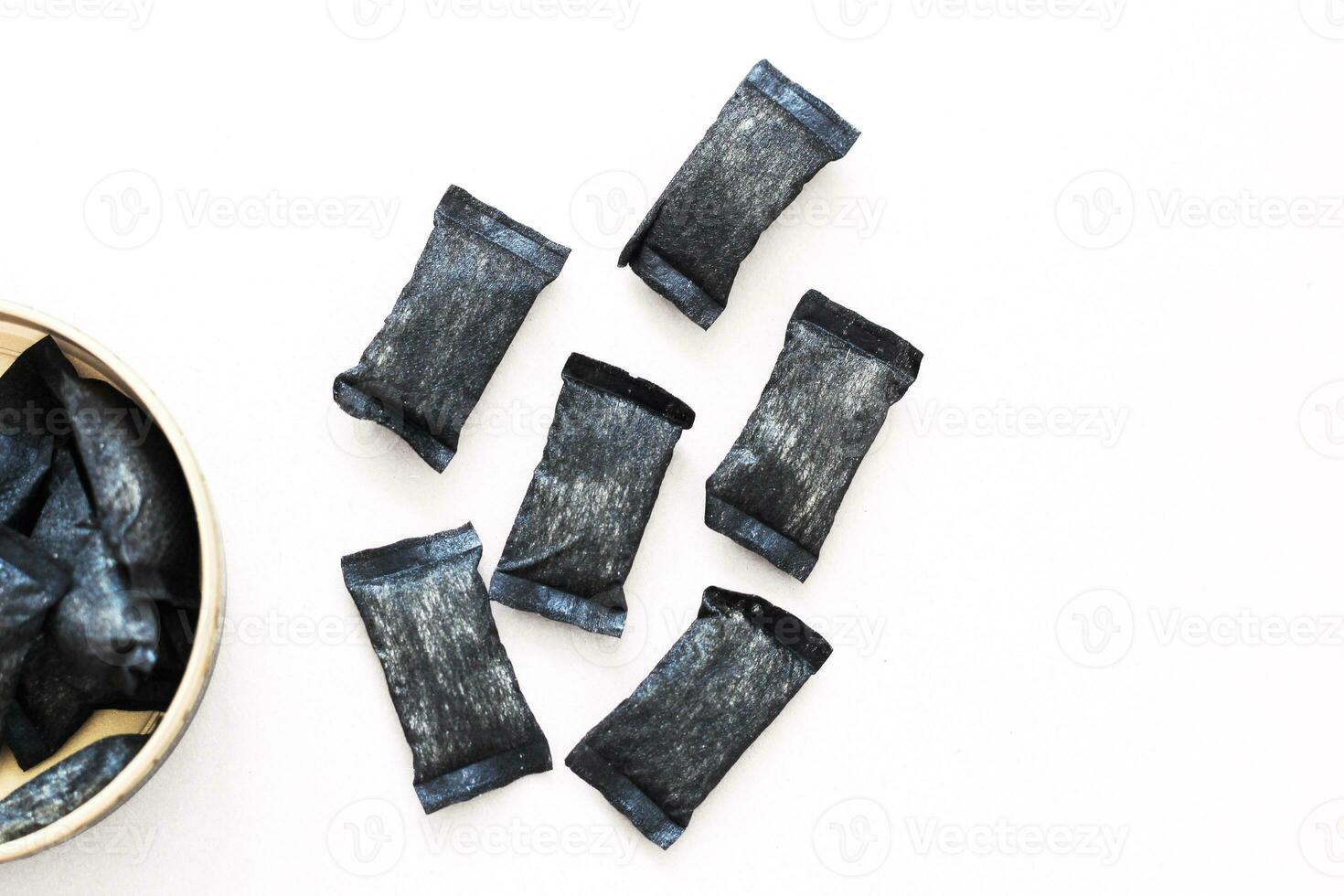 nicotine pouches tobacco, black snus on the background photo