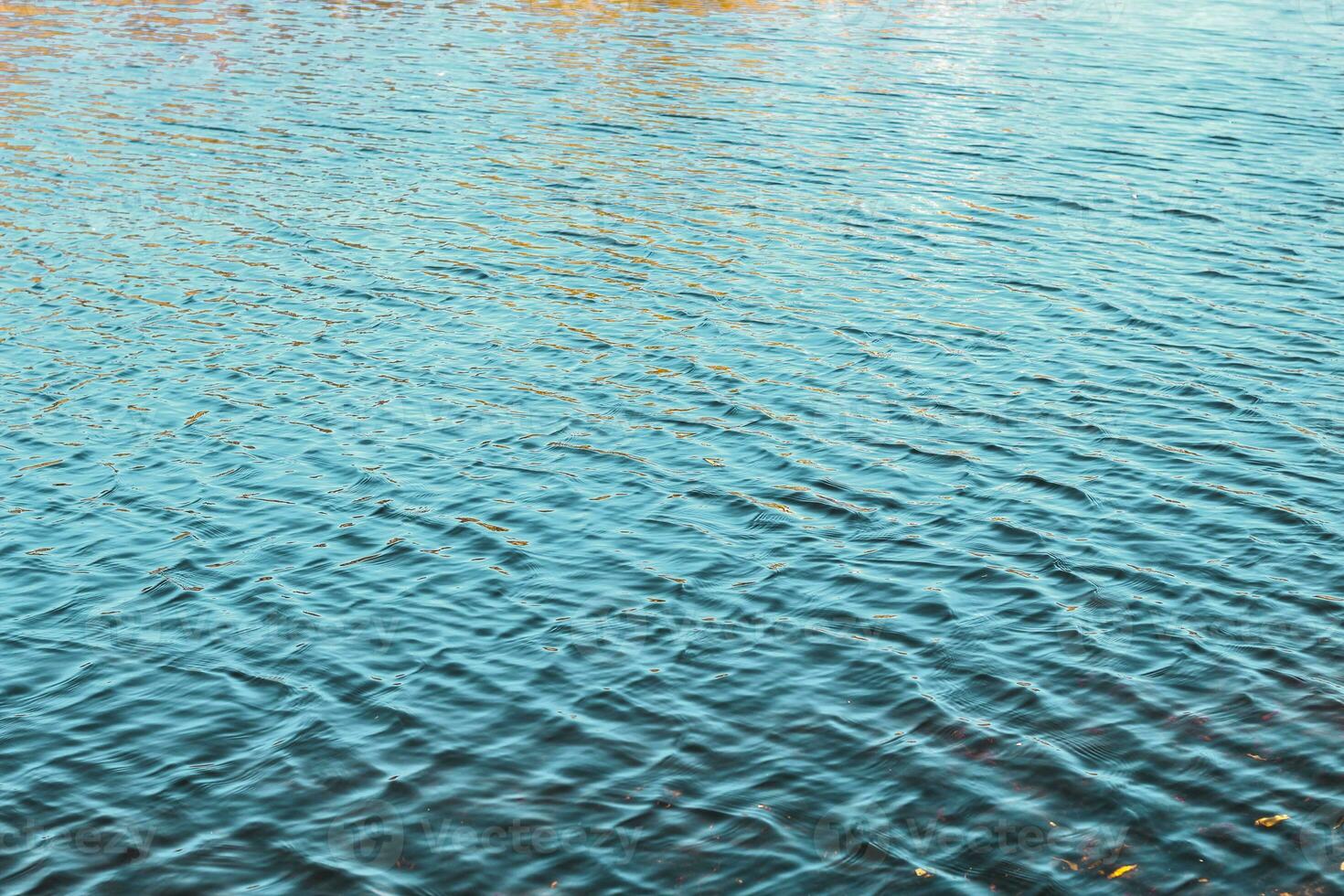 river surface texture, waves shining in the sun. photo