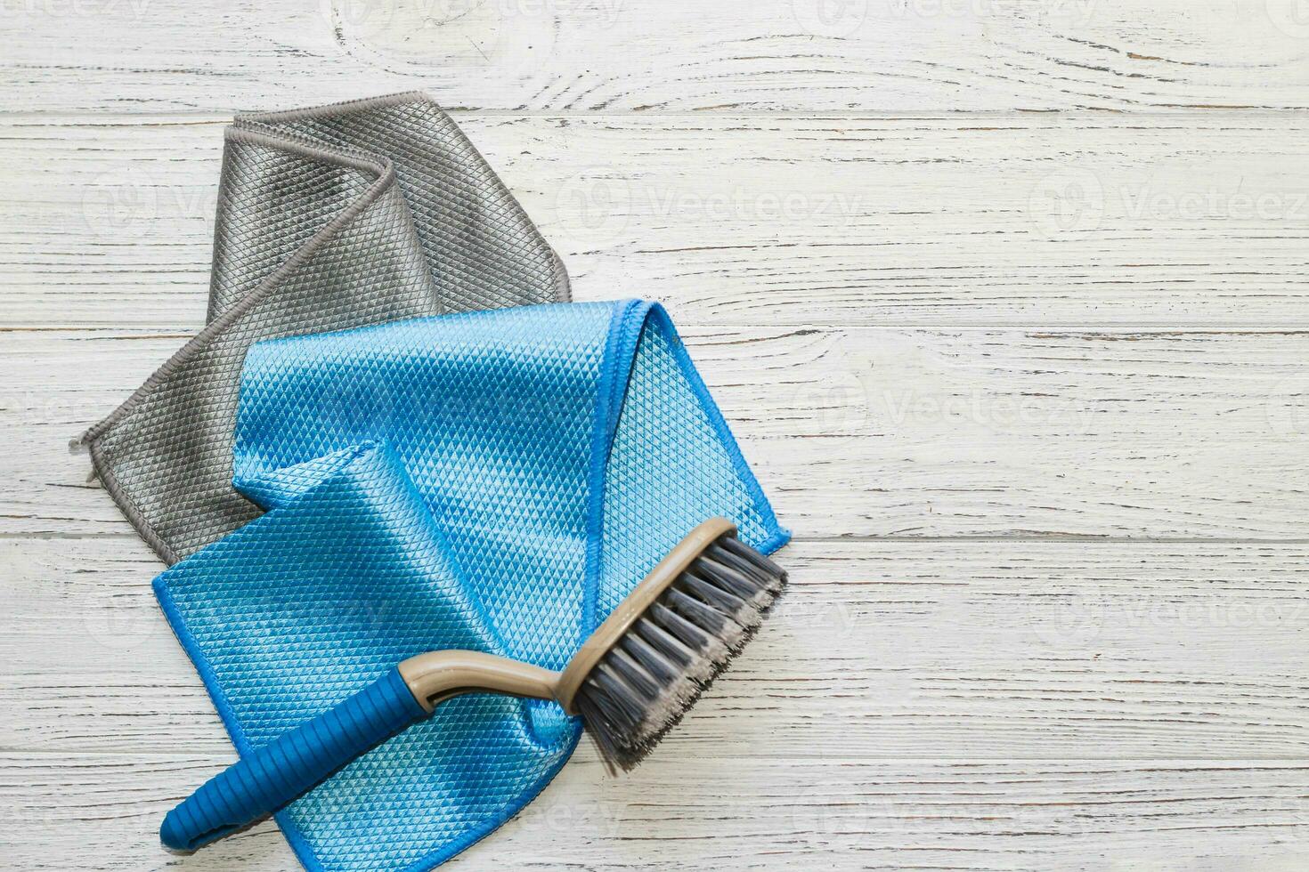 Blue and gray cloth with a special texture for cleaning glasses and dishes for household cleaning. photo