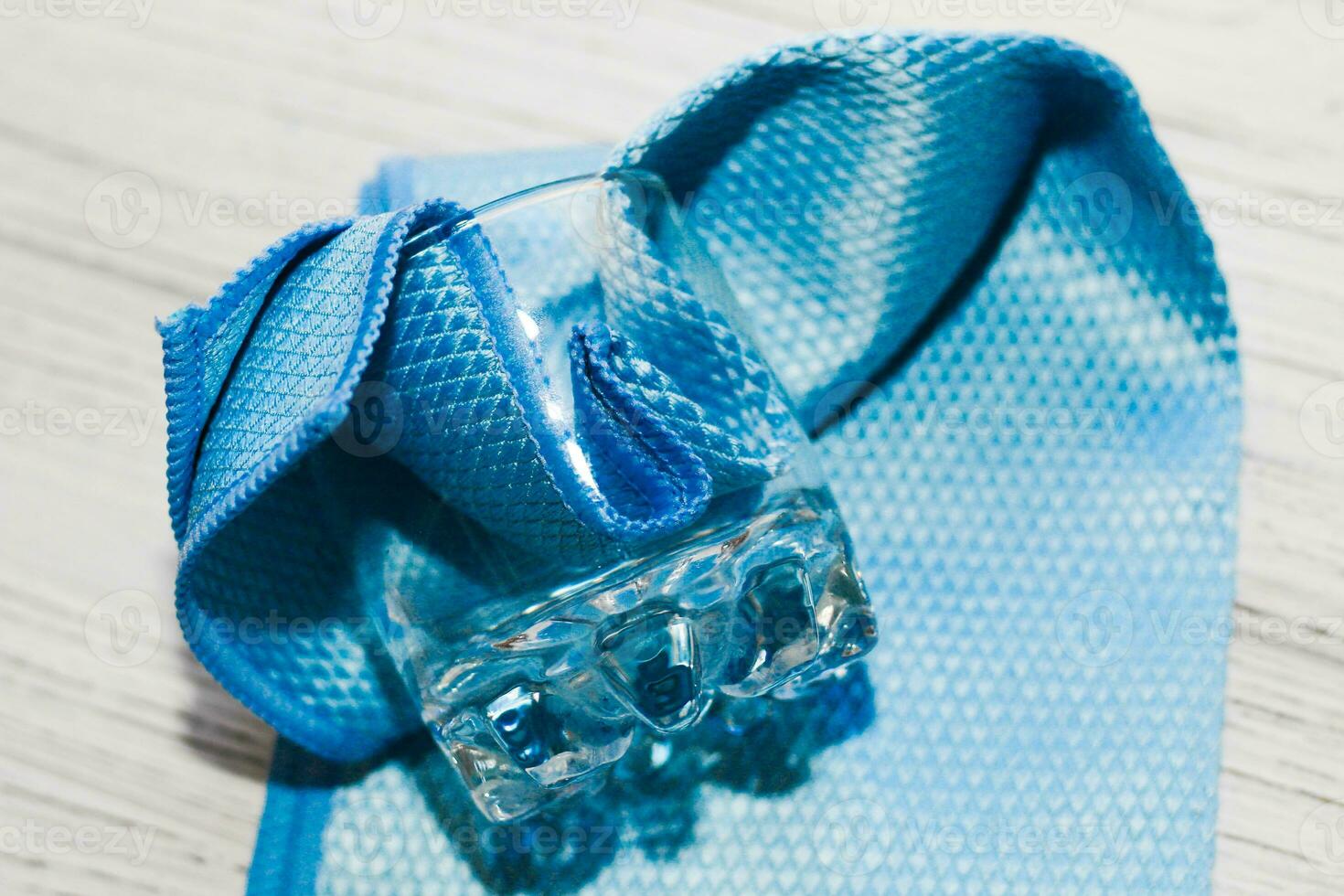a rag with a special texture for cleaning glass glasses and dishes for home use. photo