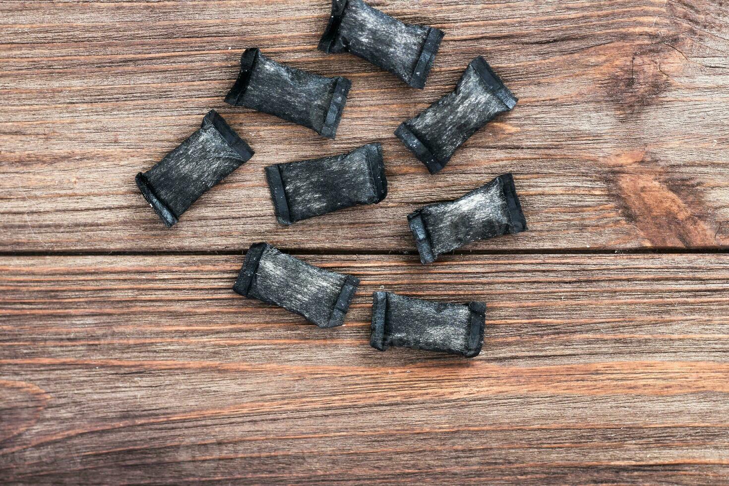 nicotine pouches tobacco, black snus on the background photo