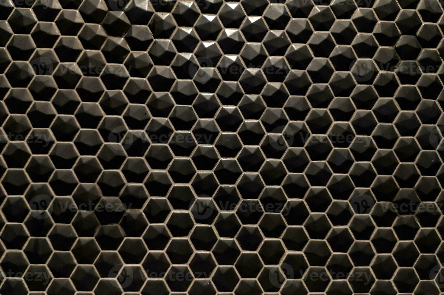 Texture of glossy black mosaic tiles hexagon photo