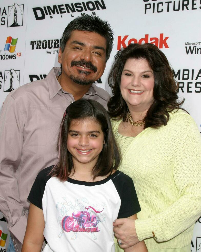 George and Ana Lopez with their daughter Mayan arriving at Shark Boy and Lava Girl Premiere El Capitan Theater Los Angeles CA June 4 2005 photo
