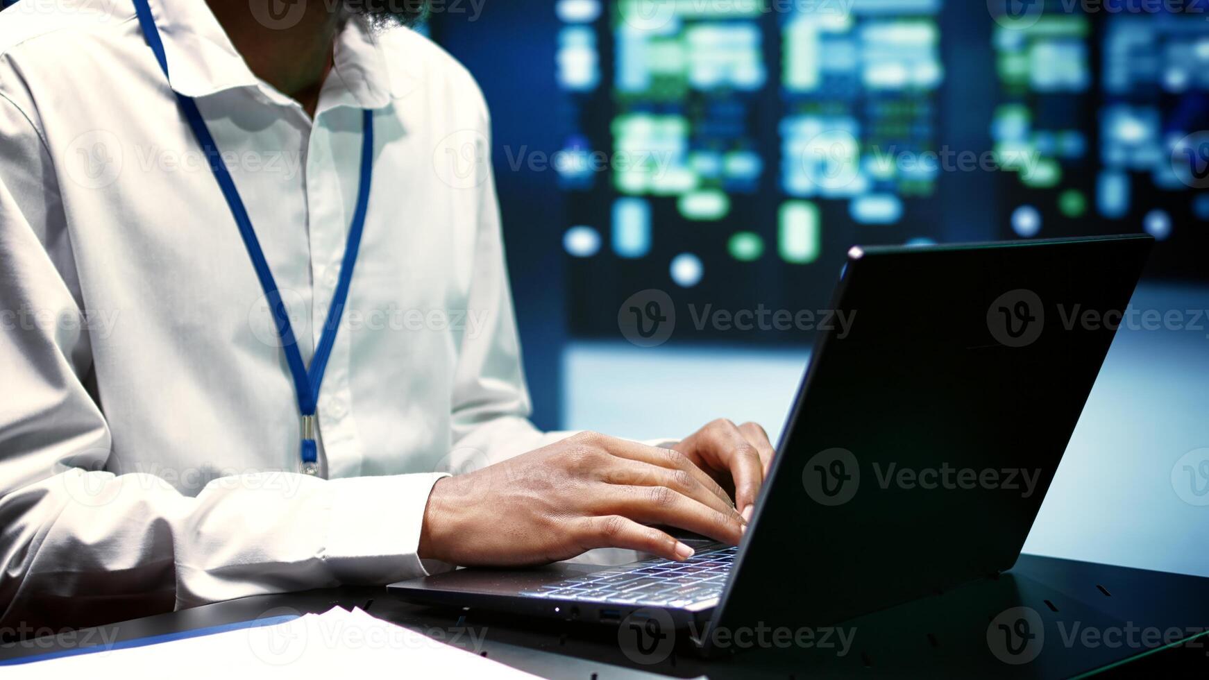 Supervisor mending data center operational issues arising due to high CPU usage, insufficient memory and misconfigured applications. Programmer overseeing server clusters performance trends photo