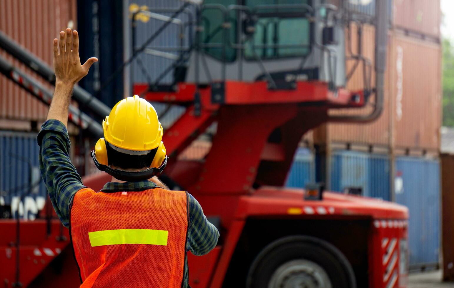 Foreman is controlling container loading in import-export business. photo