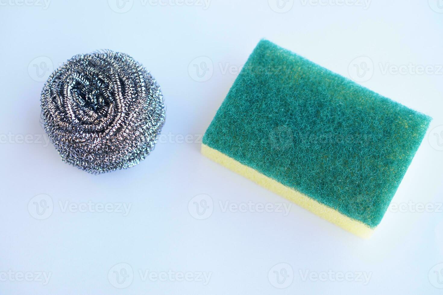 Hand cleaning the non stick pan with handy dish washing sponge 6122642  Stock Photo at Vecteezy