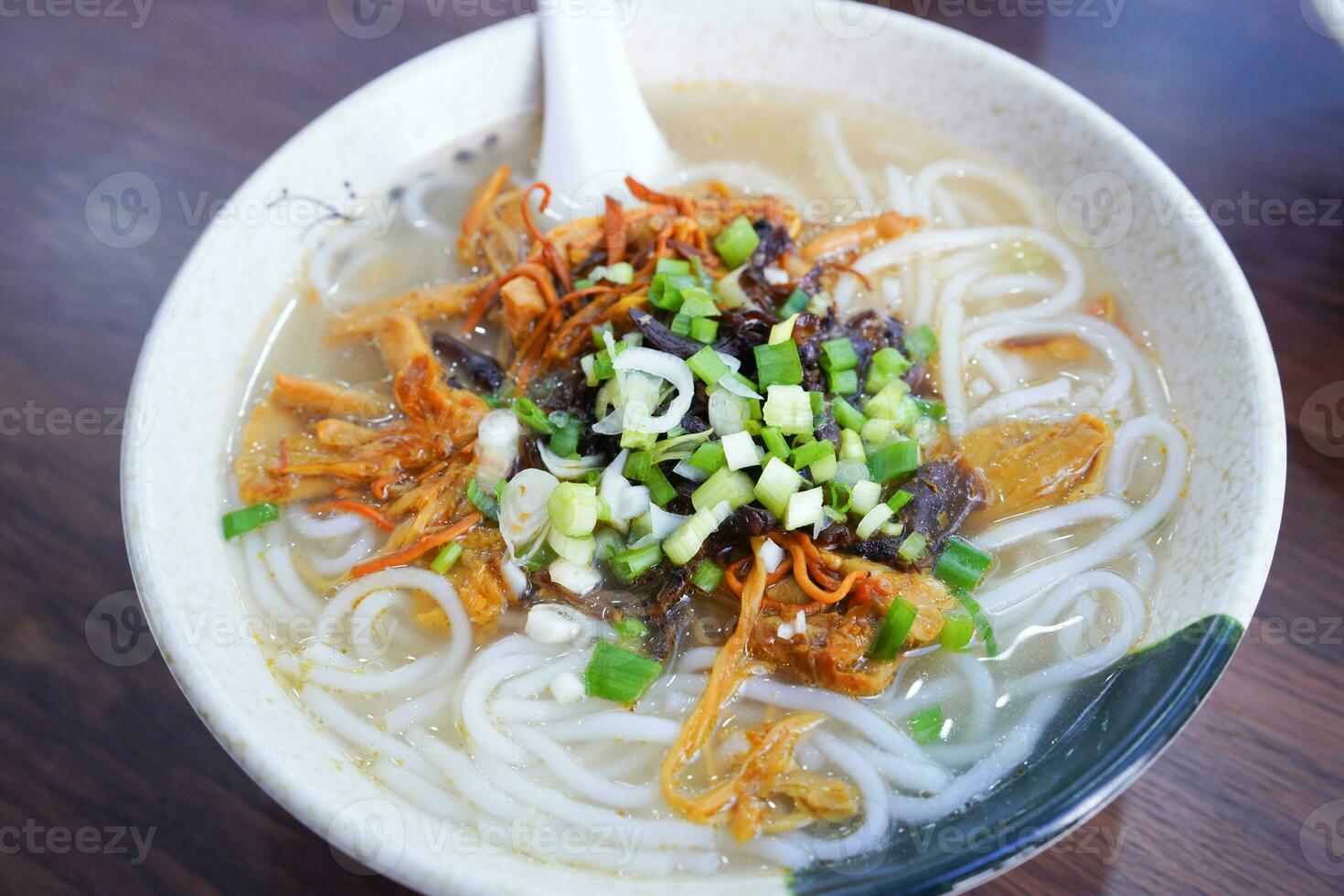 Yunnan rice noodle soup with mushroom, Chinese noodle photo